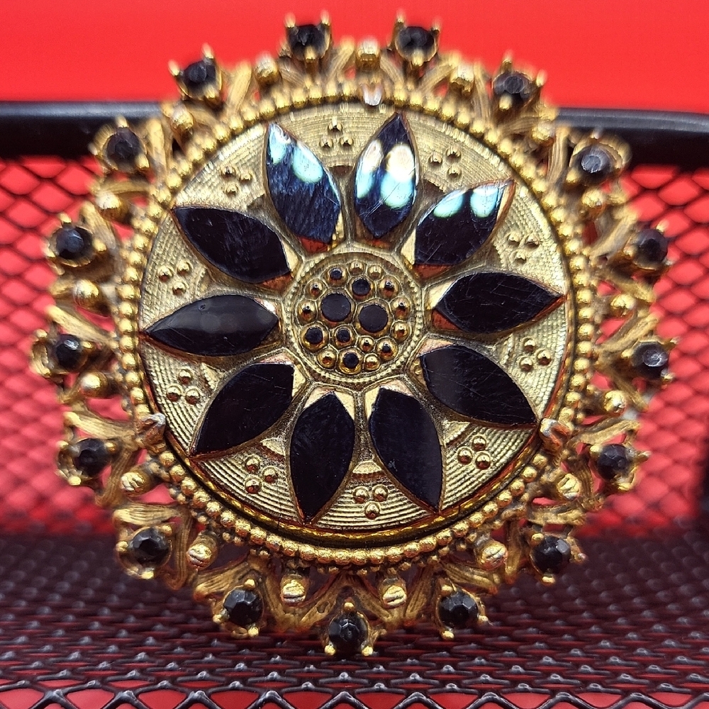 Black and Gold Starburst Brooch with Filigree Detail